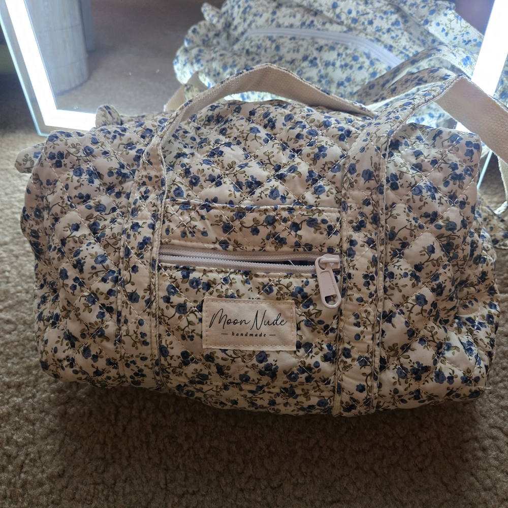 Mini Moon Nude Duffle Bag With Blue Foral Pattern